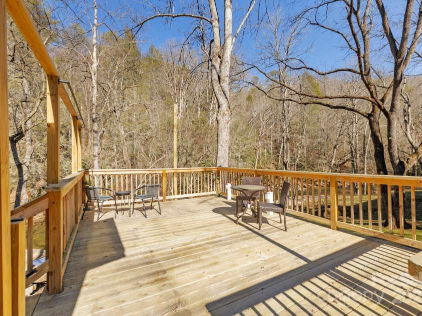 228 White Oak Road, Waynesville, NC 28785.  MLS# CAR4215162, YatesRealty ID 10603. Free standing entertaining area overlooking creek
