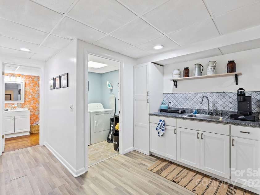 228 White Oak Road, Waynesville, NC 28785.  MLS# CAR4215162, YatesRealty ID 10603. Kitchenette downstairs