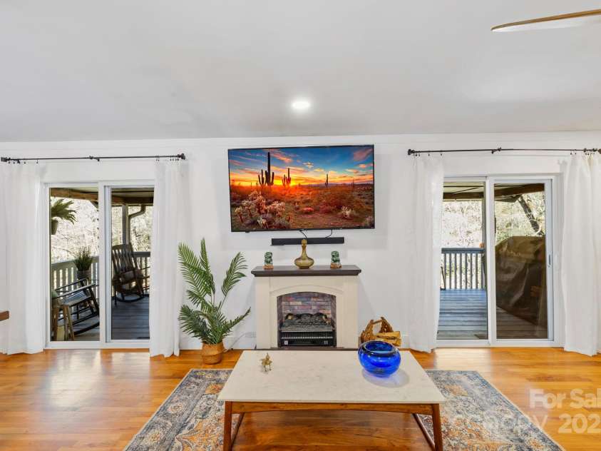 228 White Oak Road, Waynesville, NC 28785.  MLS# CAR4215162, YatesRealty ID 10603. Living room w/ great natural light