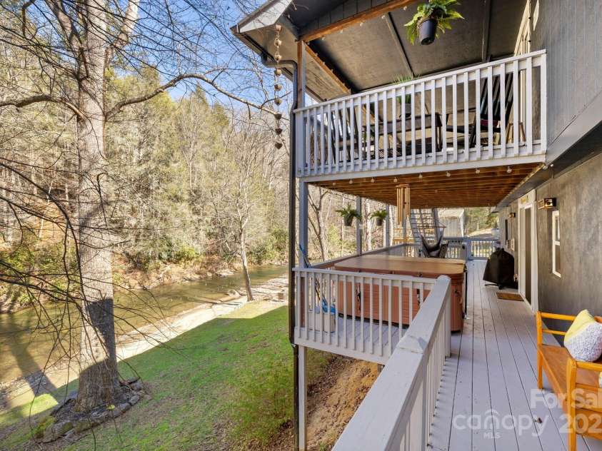 228 White Oak Road, Waynesville, NC 28785.  MLS# CAR4215162, YatesRealty ID 10603. Main and lower level porches