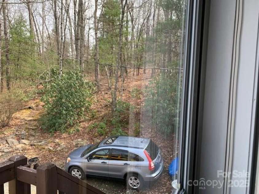 1474 HOLIDAY Drive, Hendersonville, NC 28739.  MLS# CAR4242849, YatesRealty ID 10609. Parking areas for 4+ cars