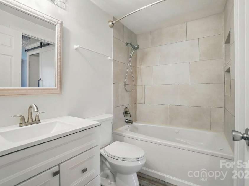 202 Water Oak Drive, Pineville, NC 28134.  MLS# CAR4250565, YatesRealty ID 10613. Full Bath with Jacuzzi tub.