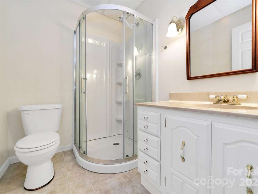 273 Inoli Circle, Brevard, NC 28712.  MLS# CAR4286189, YatesRealty ID 10618. Lower Level Bath
