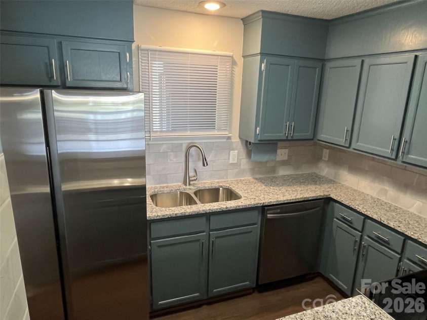 9041 J M Keynes Drive, Charlotte, NC 28262.  MLS# CAR4411303, YatesRealty ID 10626. 