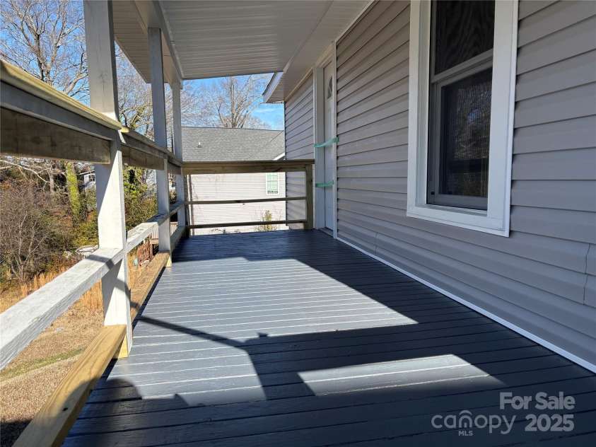 107 Meadow Avenue, Concord, NC 28025.  MLS# CAR4214924, YatesRealty ID 10627. Back porch