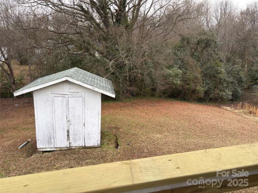 107 Meadow Avenue, Concord, NC 28025.  MLS# CAR4214924, YatesRealty ID 10627. Storage Building