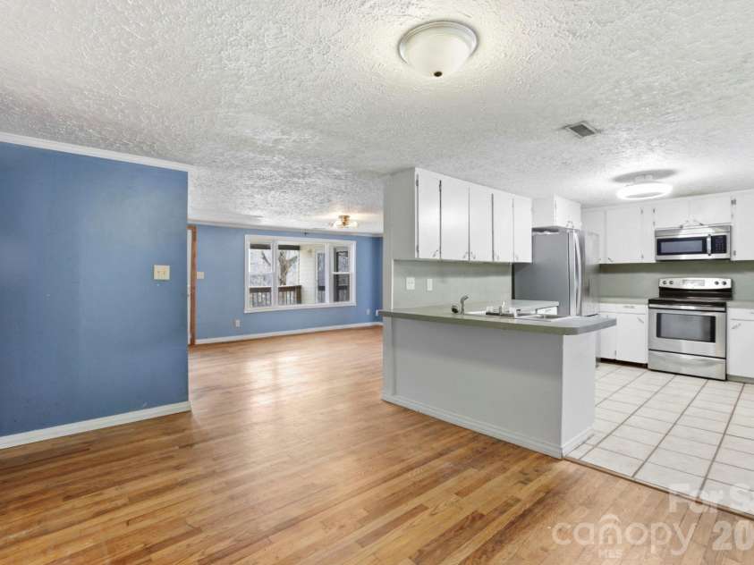 180 Whispering Pines Drive, Pisgah Forest, NC 28768.  MLS# CAR4353769, YatesRealty ID 10628. 