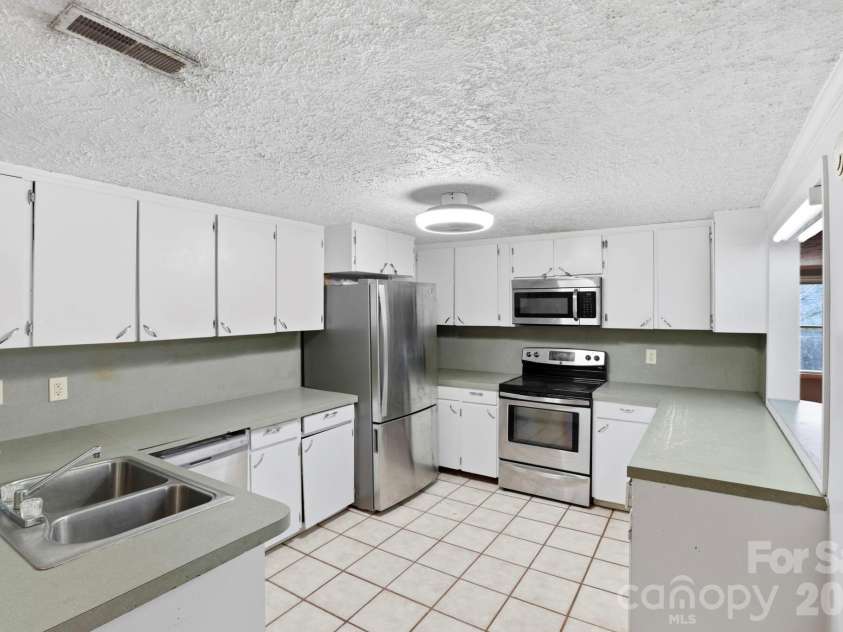 180 Whispering Pines Drive, Pisgah Forest, NC 28768.  MLS# CAR4353769, YatesRealty ID 10628. 