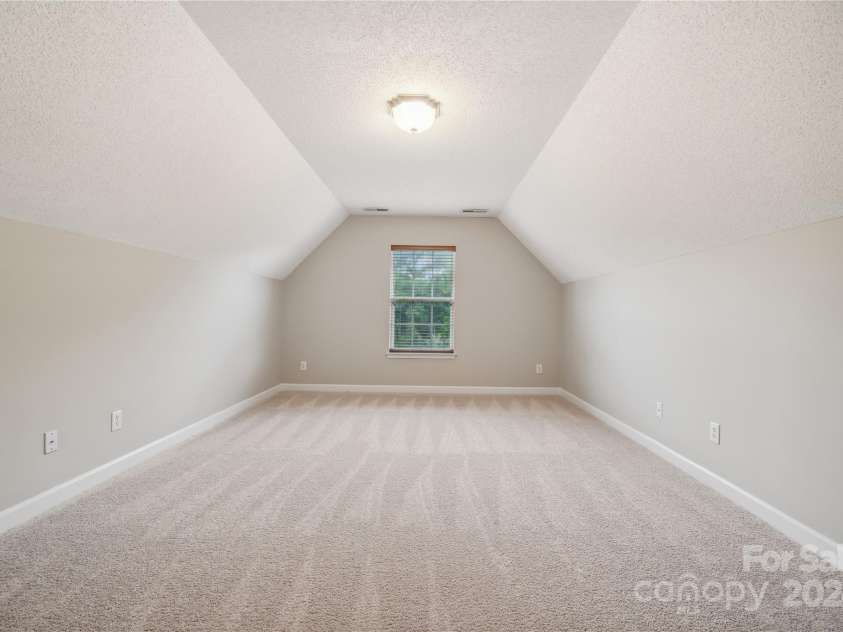 14131 Bernardy Lane, Charlotte, NC 28269.  MLS# CAR4164903, YatesRealty ID 10632. Bedroom #4, family/media room.
