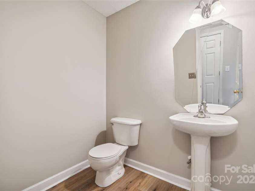 14131 Bernardy Lane, Charlotte, NC 28269.  MLS# CAR4164903, YatesRealty ID 10632. Downstairs half bath