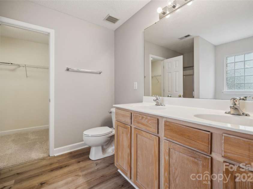 14131 Bernardy Lane, Charlotte, NC 28269.  MLS# CAR4164903, YatesRealty ID 10632. Primary bathroom