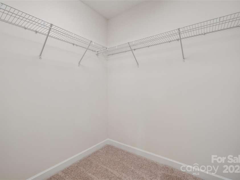 14131 Bernardy Lane, Charlotte, NC 28269.  MLS# CAR4164903, YatesRealty ID 10632. Walk-in primary closet