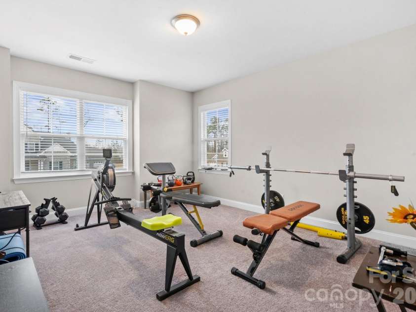 4008 Pinot Way, Fort Mill, SC 29707.  MLS# CAR4344063, YatesRealty ID 10634. Bedroom currently used as exercise room