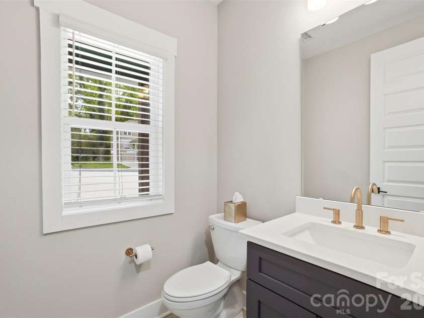 306 Lima Avenue, Charlotte, NC 28208.  MLS# CAR4363414, YatesRealty ID 10638. Downstairs half bath