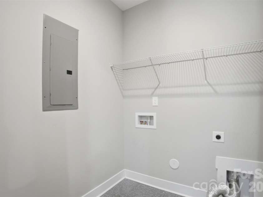 306 Lima Avenue, Charlotte, NC 28208.  MLS# CAR4363414, YatesRealty ID 10638. Downstairs laundry