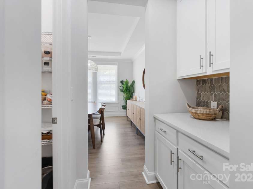 1047 Chalet Lane, Indian Land, SC 29707.  MLS# CAR4250186, YatesRealty ID 10639. Butler's pantry across from the walk in pantry.