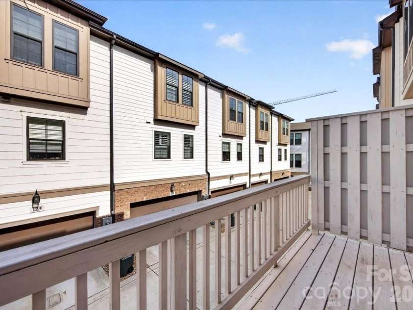 1510 Mcclintock Corners Alley, Charlotte, NC 28205.  MLS# CAR4363110, YatesRealty ID 10644. Balcony off Kitchen