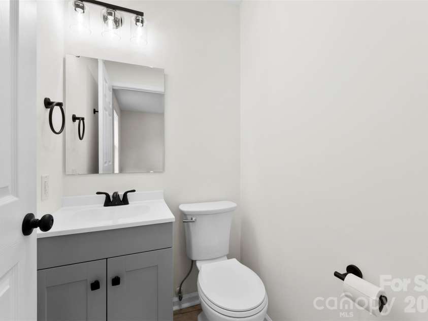 410 Cameron Avenue, Concord, NC 28025.  MLS# CAR4352351, YatesRealty ID 10645. Primary half bath