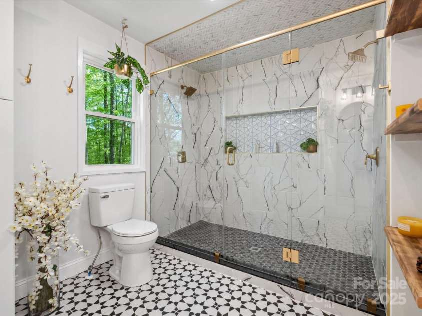 6724 Brushwood Drive, Charlotte, NC 28262.  MLS# CAR4244824, YatesRealty ID 10649. Double Shower Heads