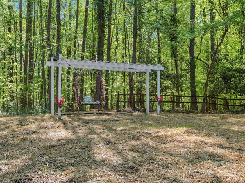 6724 Brushwood Drive, Charlotte, NC 28262.  MLS# CAR4244824, YatesRealty ID 10649. Peaceful Backyard