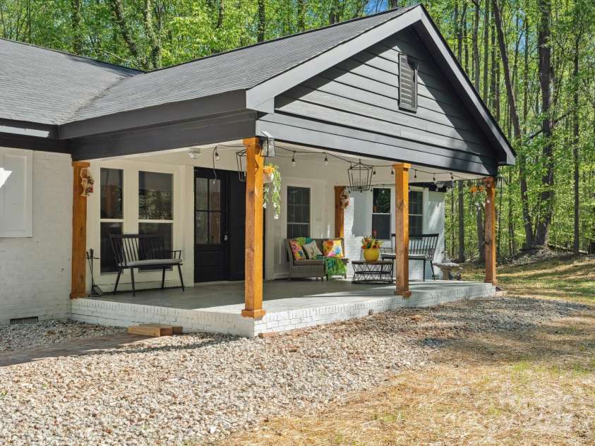 6724 Brushwood Drive, Charlotte, NC 28262.  MLS# CAR4244824, YatesRealty ID 10649. Private Covered Porch
