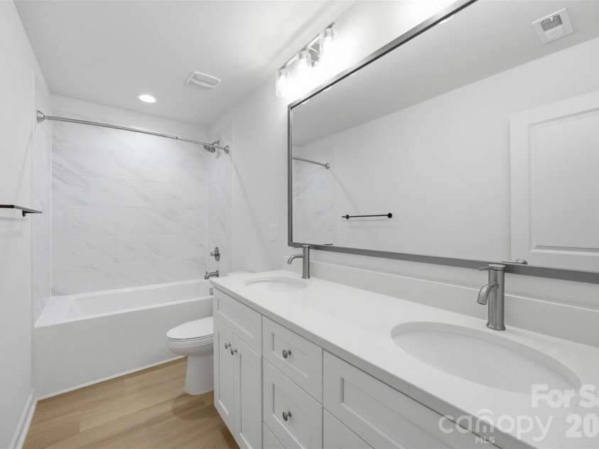 8425 Old Plank Road, Charlotte, NC 28216.  MLS# CAR4340461, YatesRealty ID 10650. Guest Bathroom - Upper Level