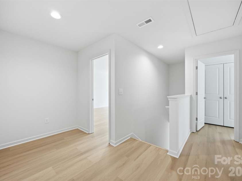 8425 Old Plank Road, Charlotte, NC 28216.  MLS# CAR4340461, YatesRealty ID 10650. Hallway Upper Level