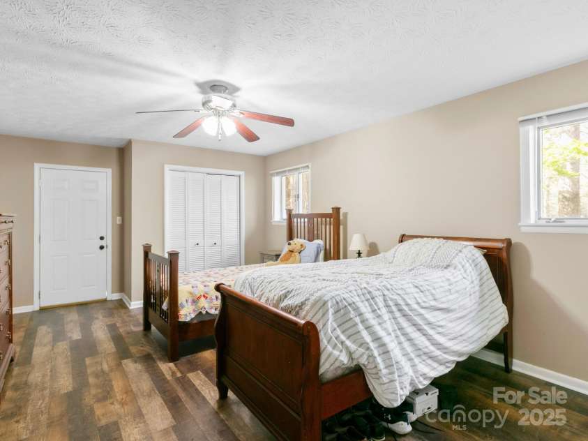 9 Cedar Trail, Asheville, NC 28803.  MLS# CAR4249342, YatesRealty ID 10651. Bedroom 4 in BSMT. Access to the exterior.