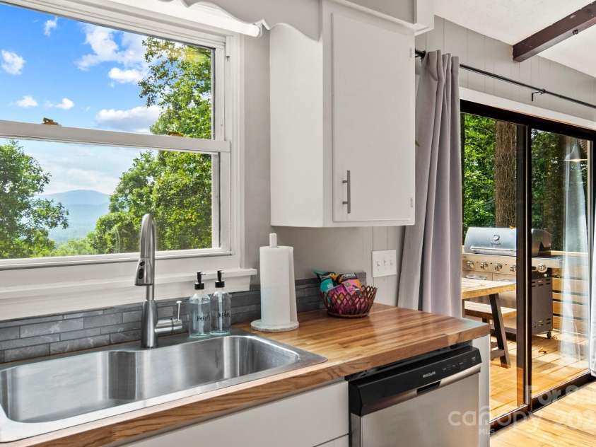 144 Laurel Road, Arden, NC 28704.  MLS# CAR4222135, YatesRealty ID 1067. 