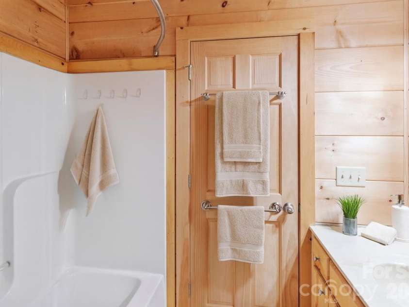 17 Aaron Way, Waynesville, NC 28786.  MLS# CAR4319469, YatesRealty ID 1067. Guest Bathroom