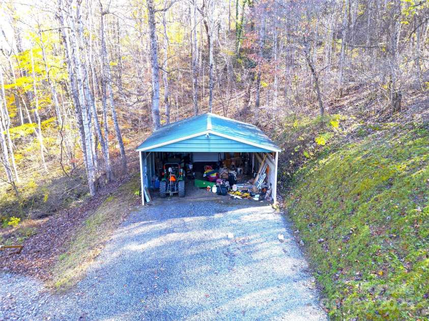 17 Aaron Way, Waynesville, NC 28786.  MLS# CAR4319469, YatesRealty ID 1067. Open Storage Area with 30 AMP 