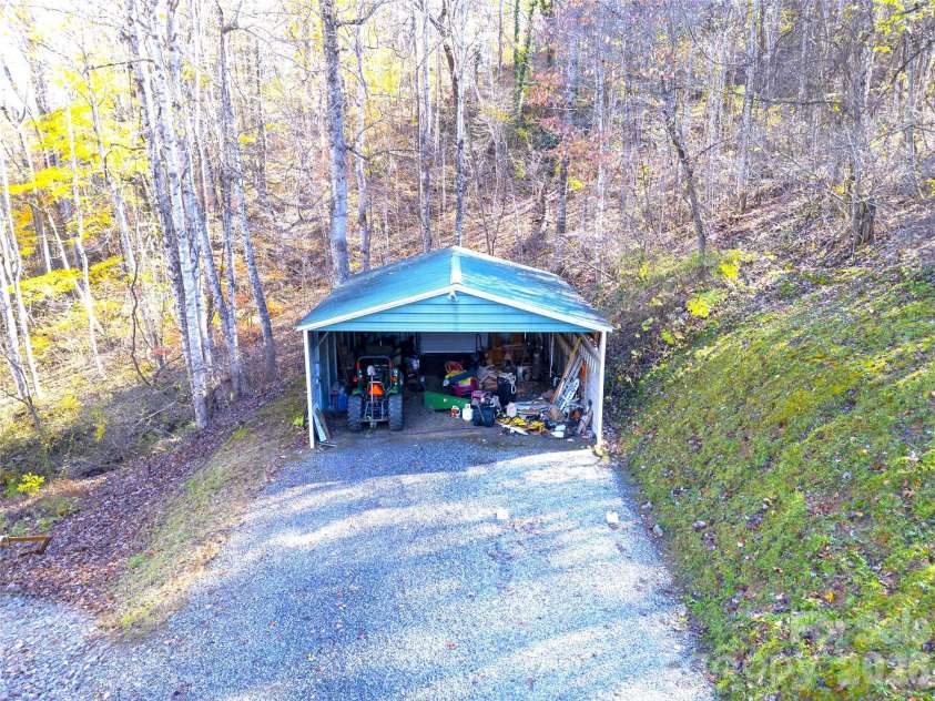 17 Aaron Way, Waynesville, NC 28786.  MLS# CAR4319469, YatesRealty ID 1067. Open Storage Area with 30 AMP 