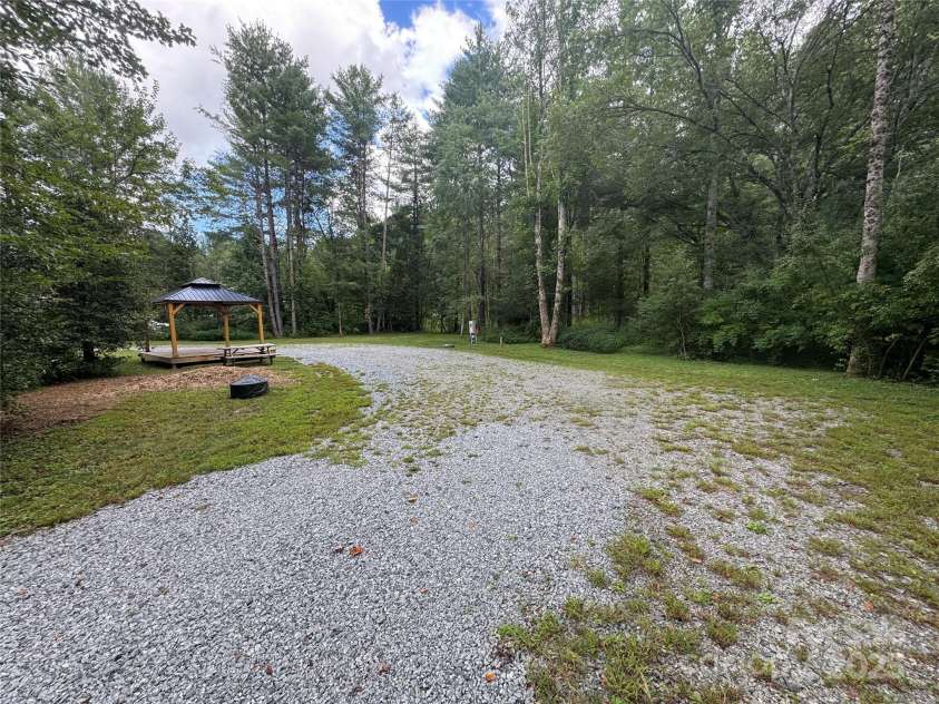 380 Cedar Lane, Brevard, NC 28712.  MLS# CAR4227901, YatesRealty ID 10673. Easy pull-through access, extra lot ready for RV. 