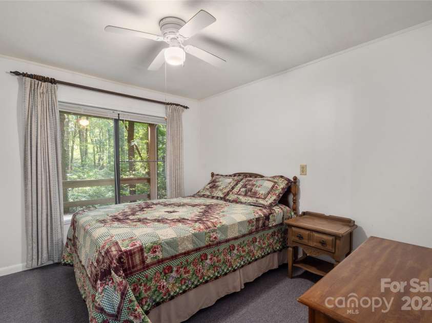 85 Susan Drive, Maggie Valley, NC 28751.  MLS# CAR4182958, YatesRealty ID 1068. Down stairs bedroom
