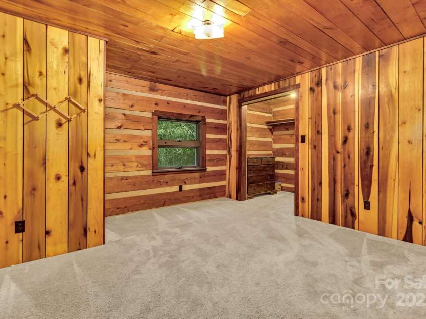 200 Dry Branch Road, Marshall, NC 28753.  MLS# CAR4308414, YatesRealty ID 10680. Back Bedroom
