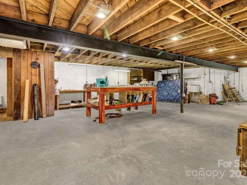 200 Dry Branch Road, Marshall, NC 28753.  MLS# CAR4308414, YatesRealty ID 10680. Basement Workshop