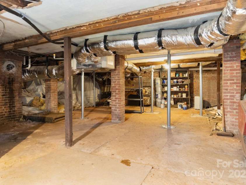 302 Iron Ridge Loop, Asheville, NC 28806.  MLS# CAR4321229, YatesRealty ID 10682. Basement with reinforcements