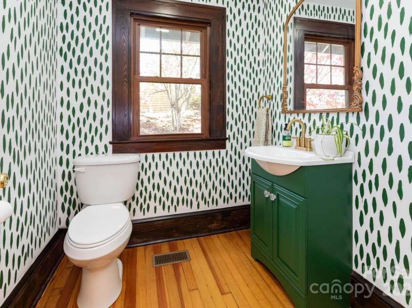 302 Iron Ridge Loop, Asheville, NC 28806.  MLS# CAR4321229, YatesRealty ID 10682. Half-bath off kitchen