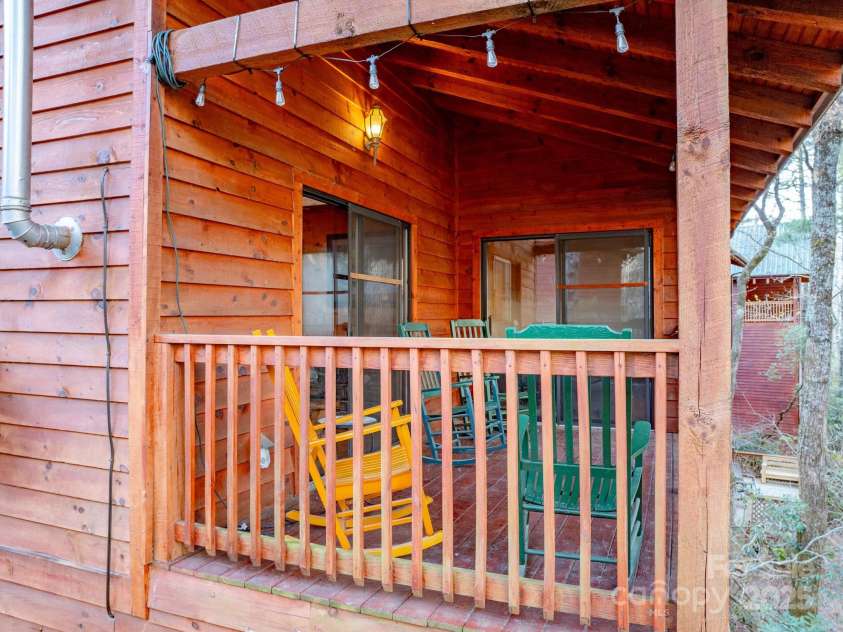 71 Creekside Loop, Spruce Pine, NC 28777.  MLS# CAR4248897, YatesRealty ID 10684. Front porch