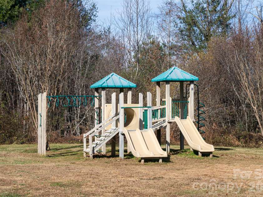 98 Sovereign Lane, Fairview, NC 28730.  MLS# CAR4326130, YatesRealty ID 10689. Community playground