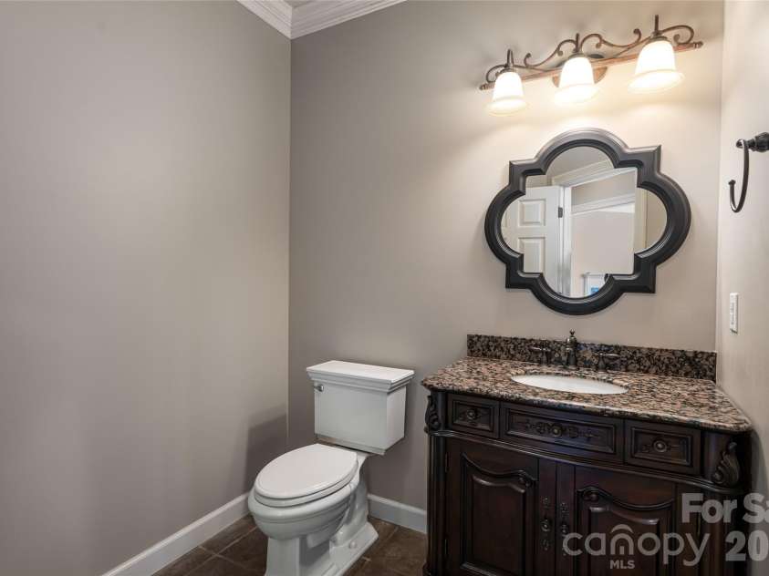 98 Sovereign Lane, Fairview, NC 28730.  MLS# CAR4326130, YatesRealty ID 10689. Half Bath main level