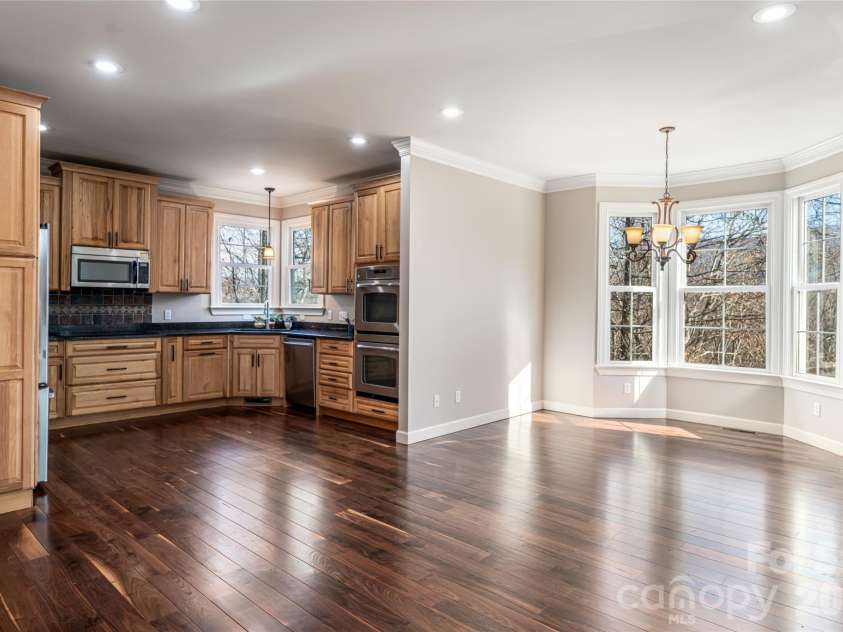 98 Sovereign Lane, Fairview, NC 28730.  MLS# CAR4326130, YatesRealty ID 10689. Oversized kitchens open space to breakfast nook