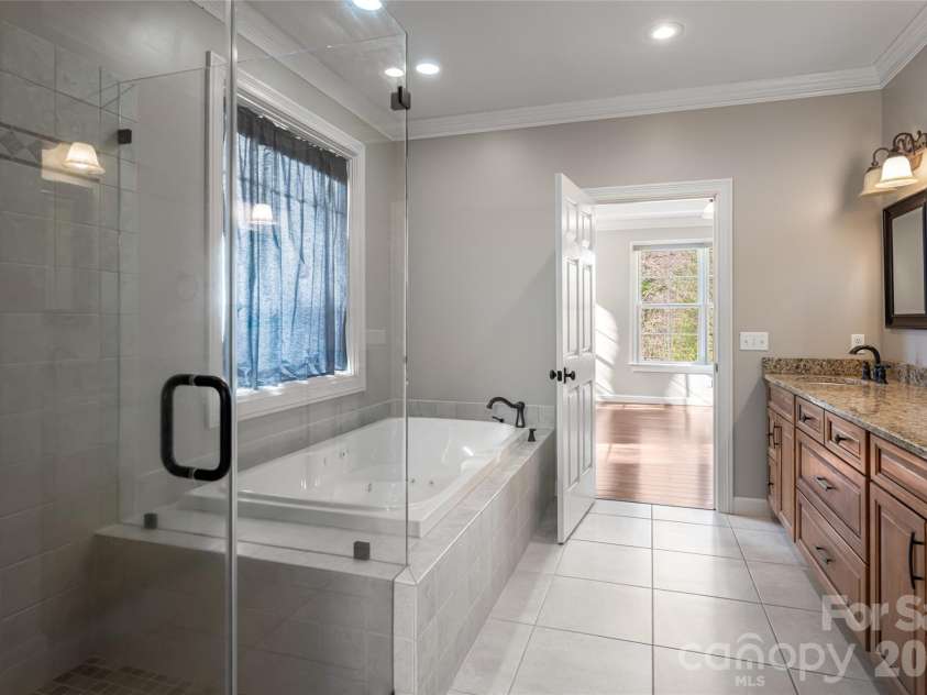 98 Sovereign Lane, Fairview, NC 28730.  MLS# CAR4326130, YatesRealty ID 10689. Primary bath