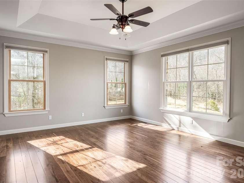 98 Sovereign Lane, Fairview, NC 28730.  MLS# CAR4326130, YatesRealty ID 10689. Primary bedroom main level