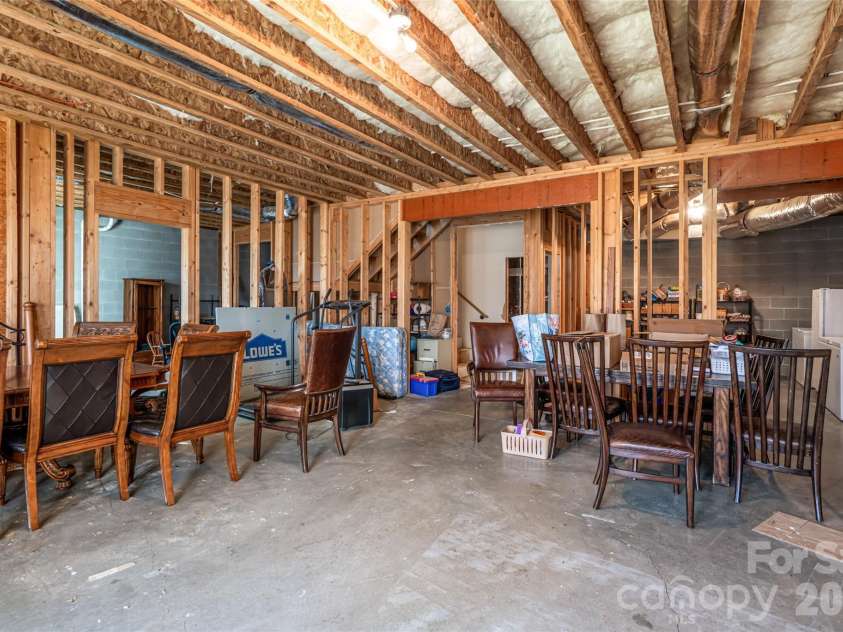 98 Sovereign Lane, Fairview, NC 28730.  MLS# CAR4326130, YatesRealty ID 10689. Unfinished basement, endless possibilities