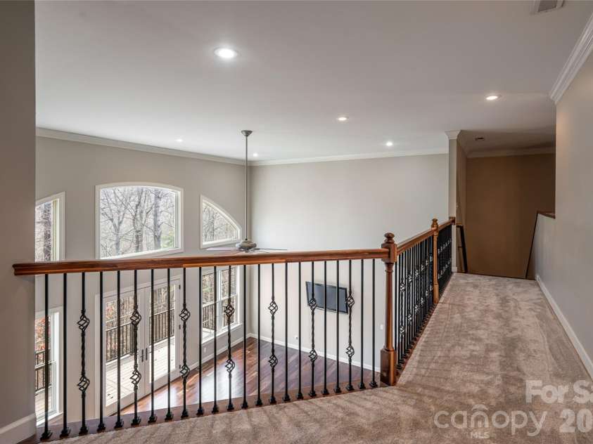 98 Sovereign Lane, Fairview, NC 28730.  MLS# CAR4326130, YatesRealty ID 10689. Upper level hall to bedrooms
