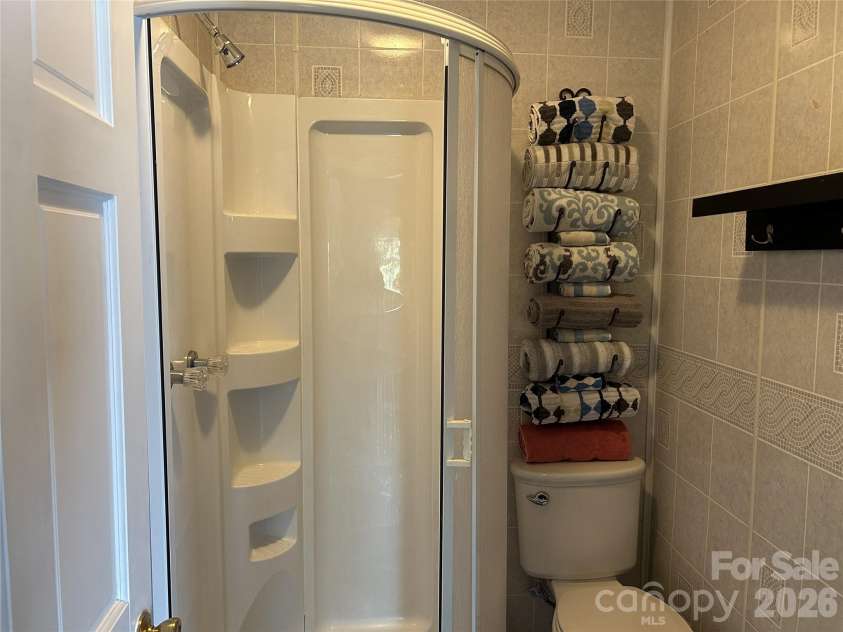 3695 NC 9 Highway, Mill Spring, NC 28756.  MLS# CAR4364501, YatesRealty ID 10700. Cottage Bath