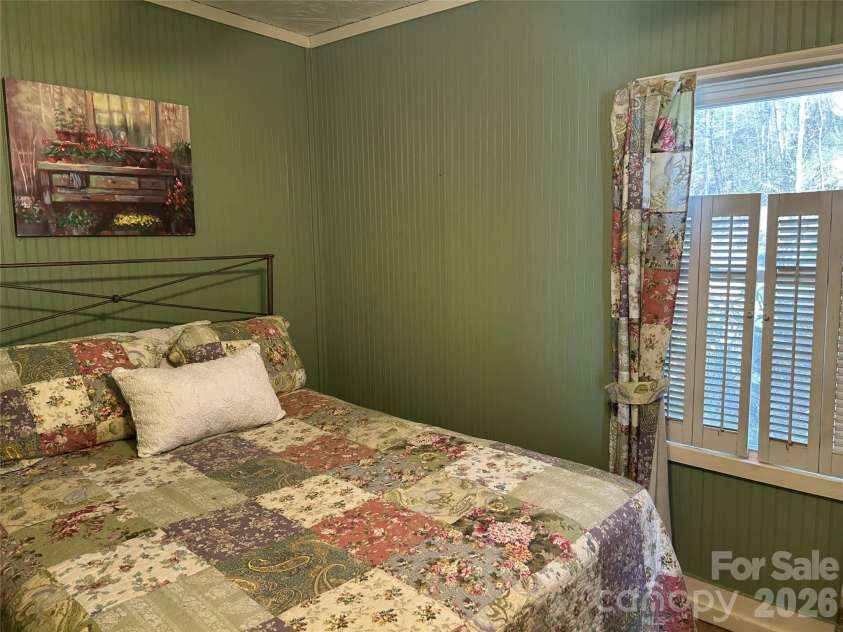 3695 NC 9 Highway, Mill Spring, NC 28756.  MLS# CAR4364501, YatesRealty ID 10700. Cottage Bedroom 1