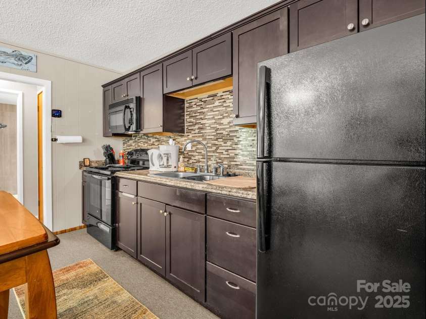 128 Winding Creek Court, Lake Lure, NC 28746.  MLS# CAR4252043, YatesRealty ID 10704. 