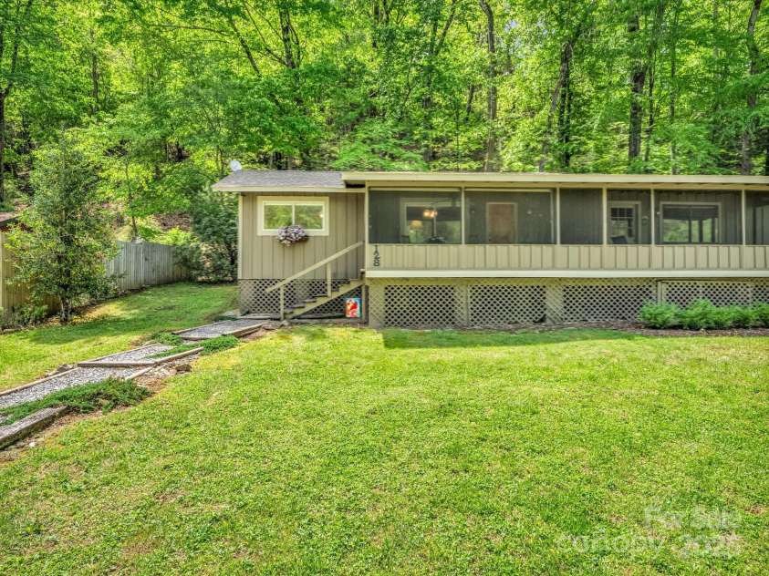 128 Winding Creek Court, Lake Lure, NC 28746.  MLS# CAR4252043, YatesRealty ID 10704. 